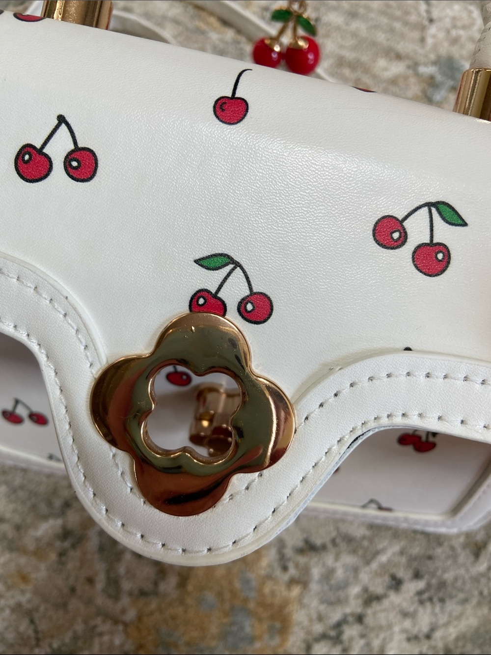 White Cherry Print Mini Crossbody Bag with Top Handle and Turn Lock Hardware - Picture 11 of 12